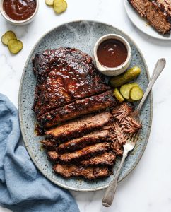Slow Cooked BBQ Brisket sliced and glazed, fork-tender and juicy with sticky sauce, ready for sandwiches